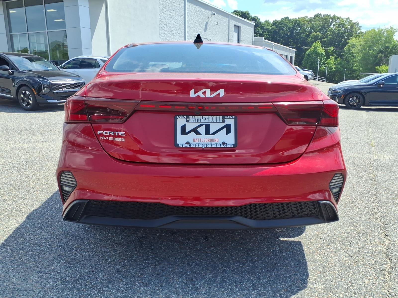 Used 2023 Currant Red Kia LXS image 21