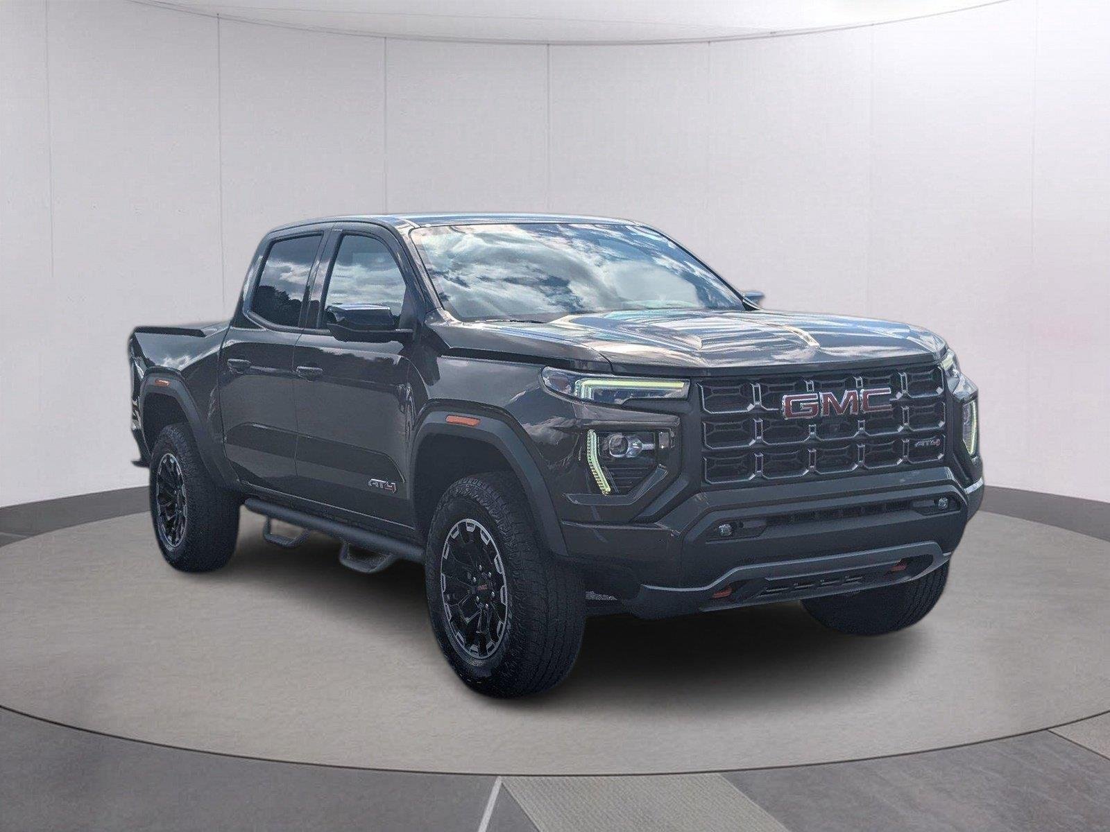 Used 2024 Deep Bronze Metallic GMC AT4 image 9