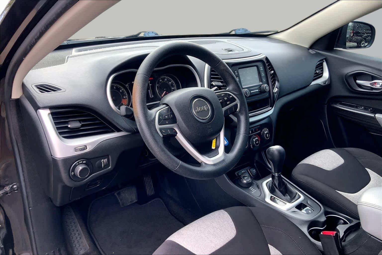 Used 2014 Brilliant Black Crystal Pearlcoat Jeep Sport image 16