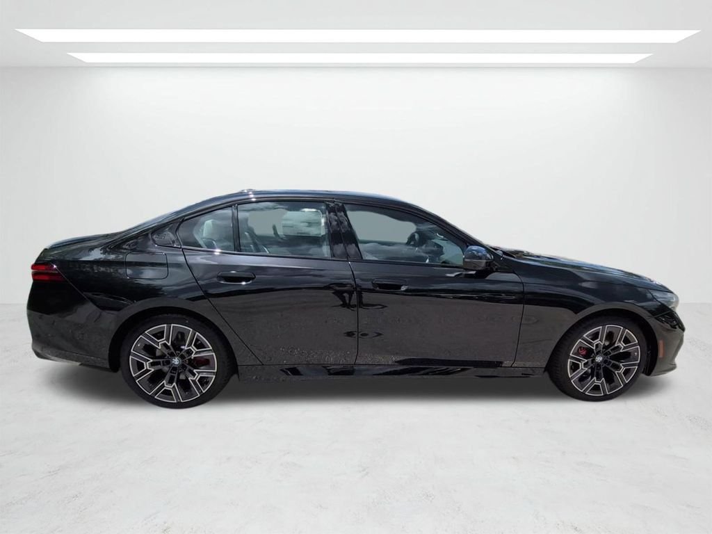 New 2027 Black Sapphire Metallic BMW 530i image 3