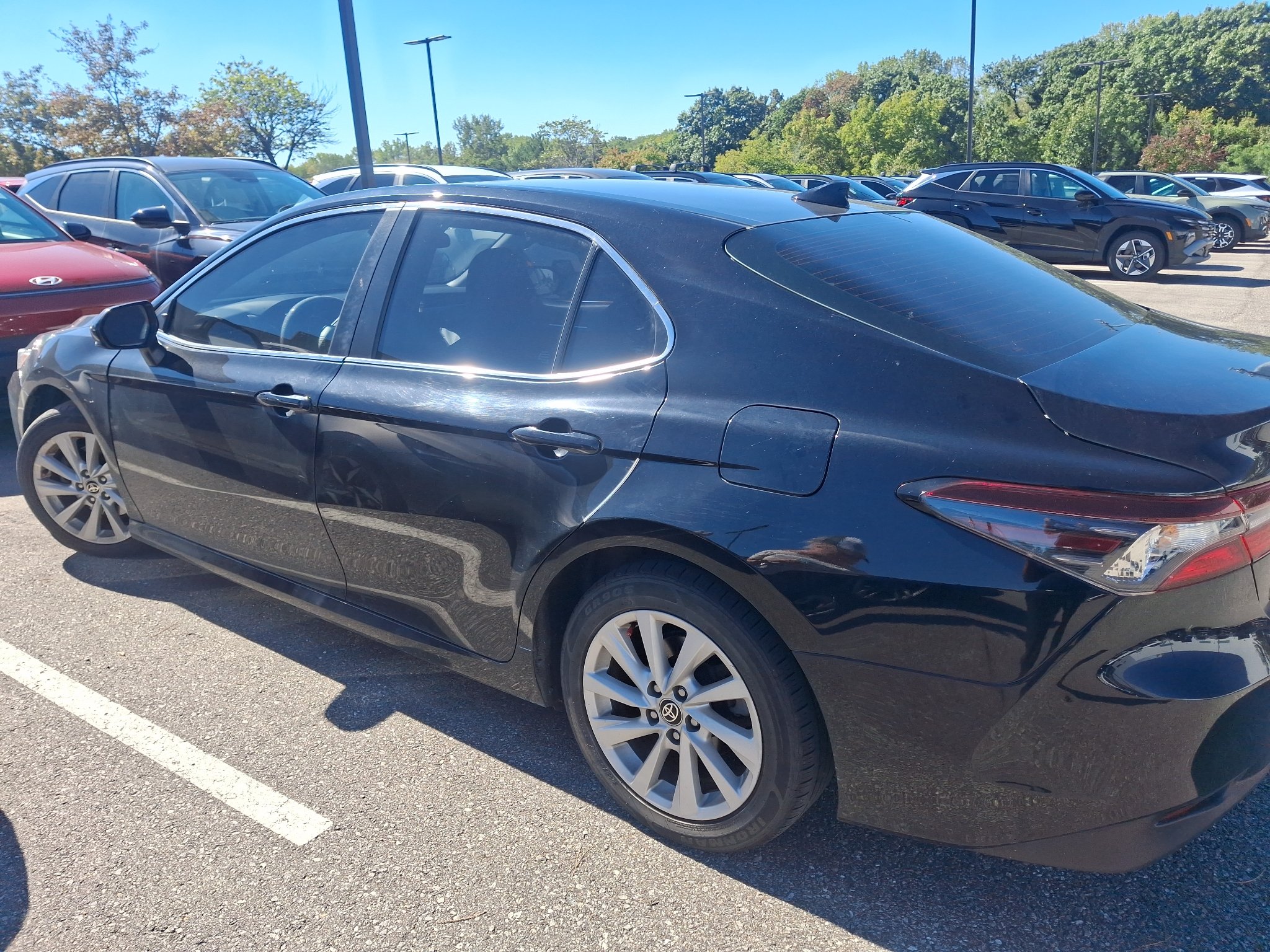 Used 2022 Midnight Black Metallic Toyota LE image 7
