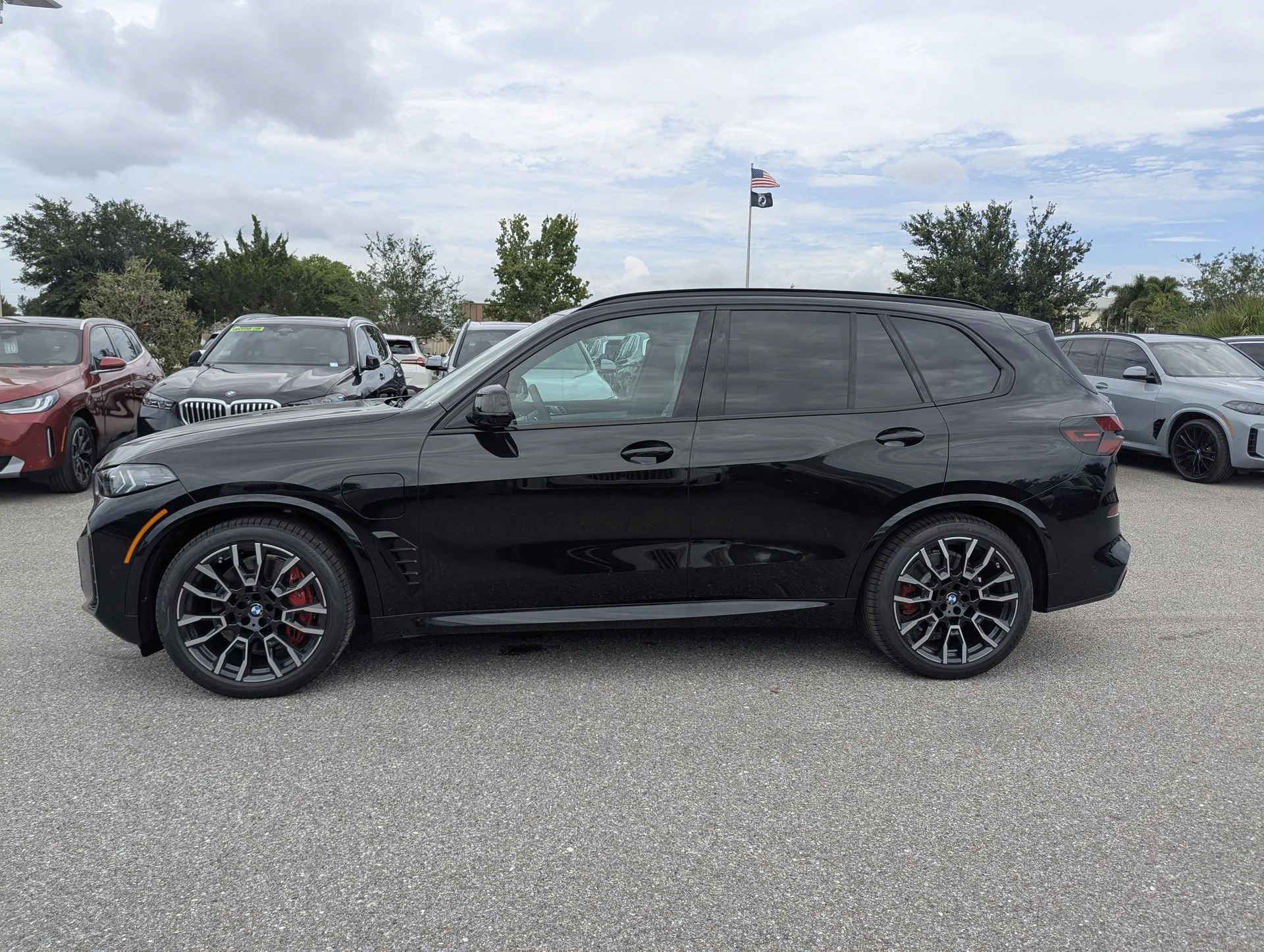 New 2026 Black Sapphire Metallic BMW xDrive50e image 4