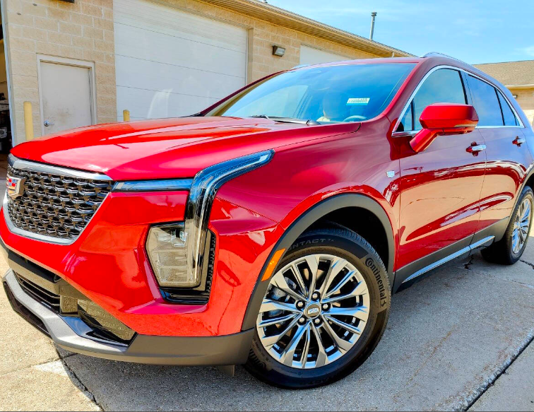 Used 2024 Red Cadillac Premium Luxury image 1