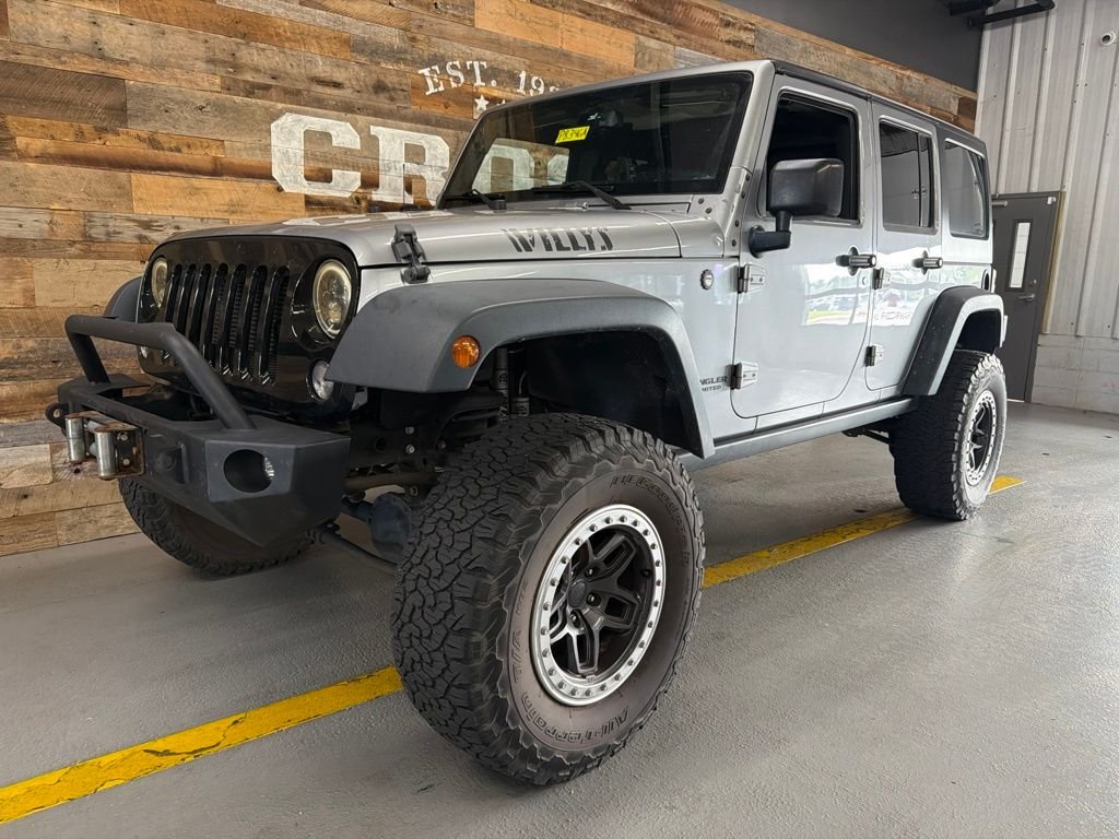 Used 2016 Billet Silver Metallic Jeep Unlimited Sport image 2
