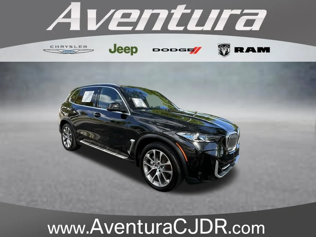 Certified Used 2024 Black BMW xDrive40i image 1
