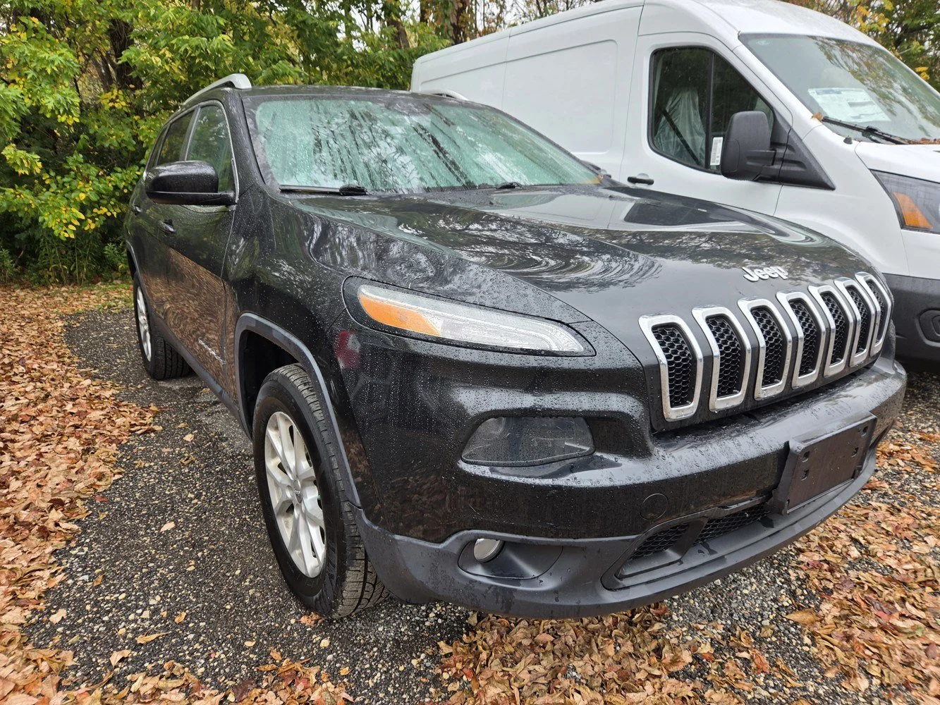 Used 2014 Brilliant Black Crystal Pearlcoat Jeep Latitude image 1
