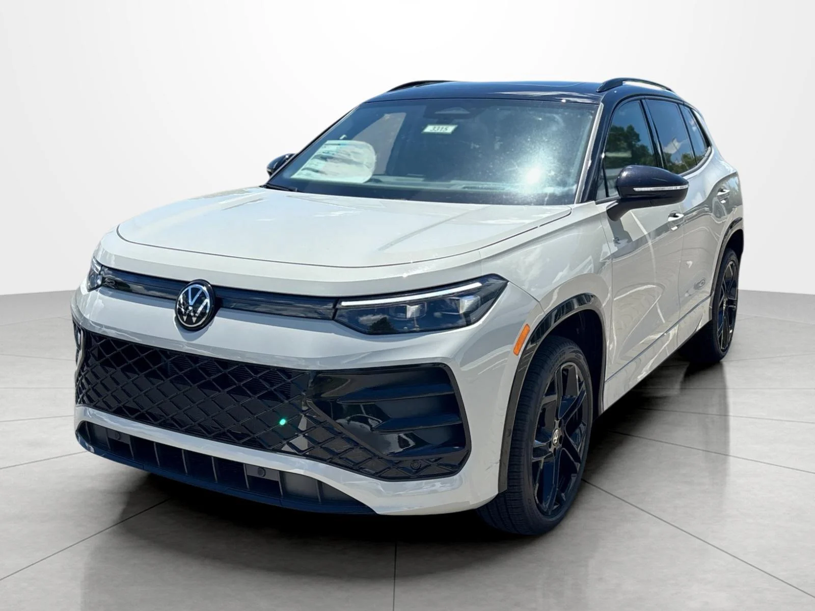 New 2026 sandstone with deep black roof Volkswagen SE R-Line Black image 1