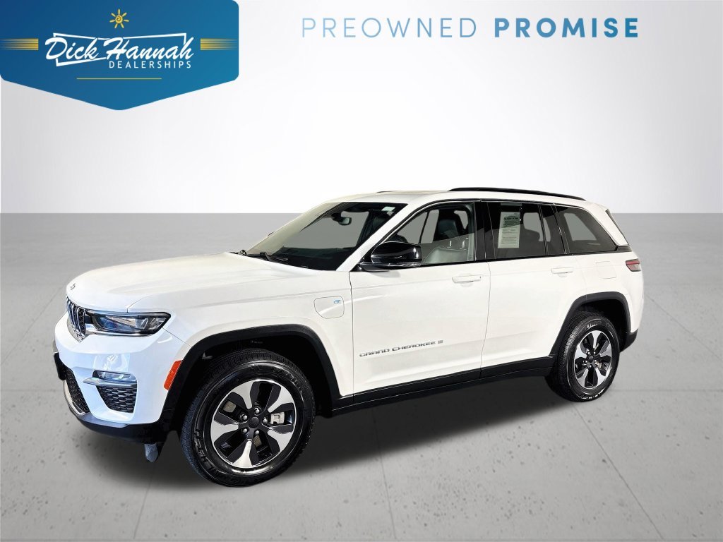 Used 2024 Bright White Clearcoat Jeep 4xe image 1