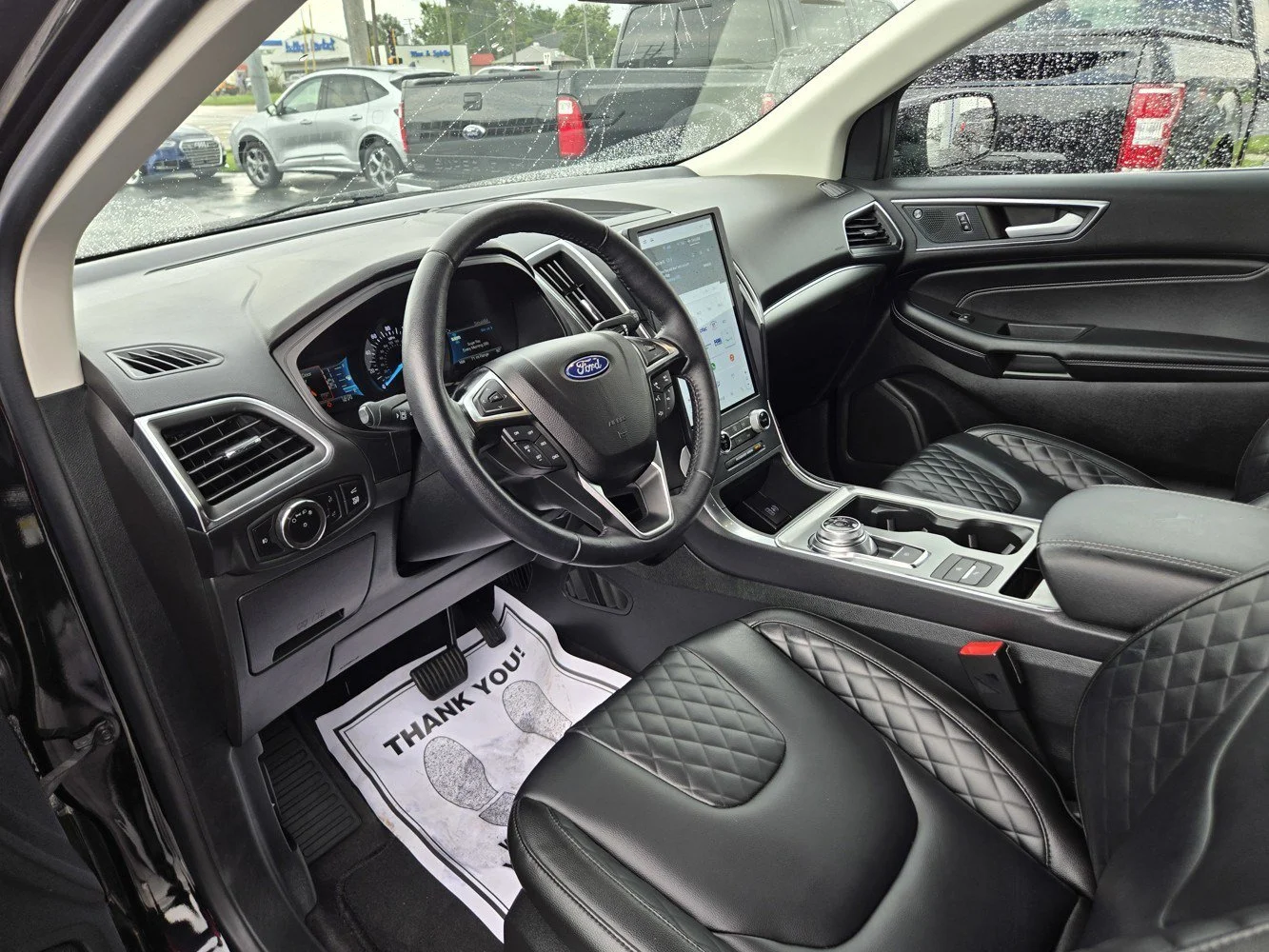 Used 2023 Agate Black Ford Titanium image 2