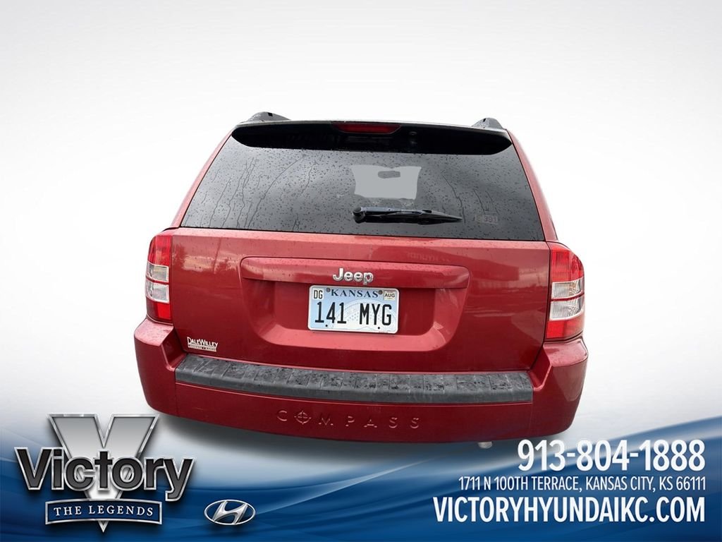 Used 2010 Red Jeep Sport image 6