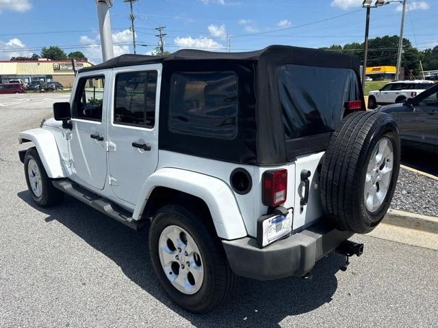 Used 2014 White Jeep Unlimited Sahara image 6