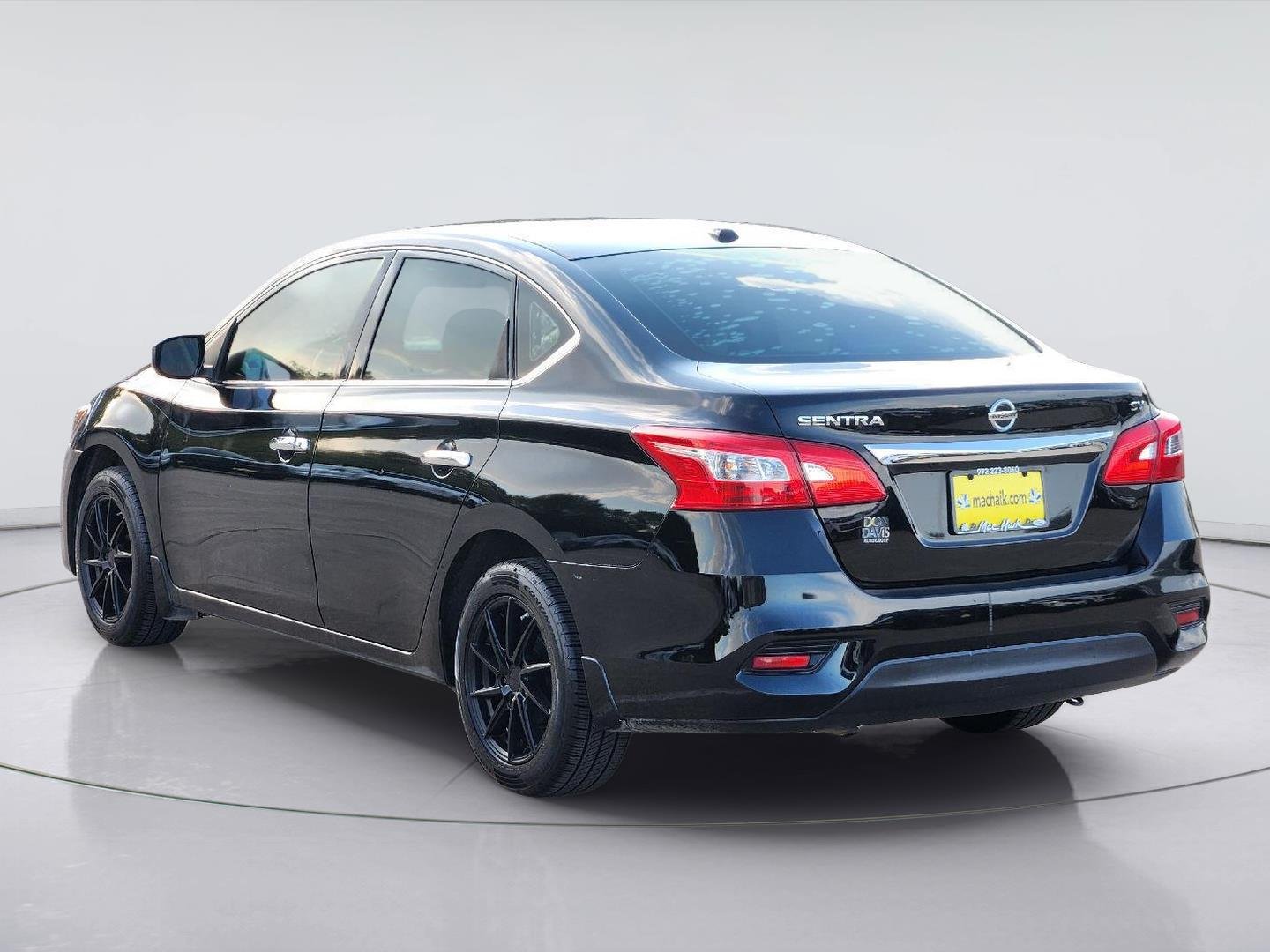 Used 2016 Super Black Nissan SV image 4