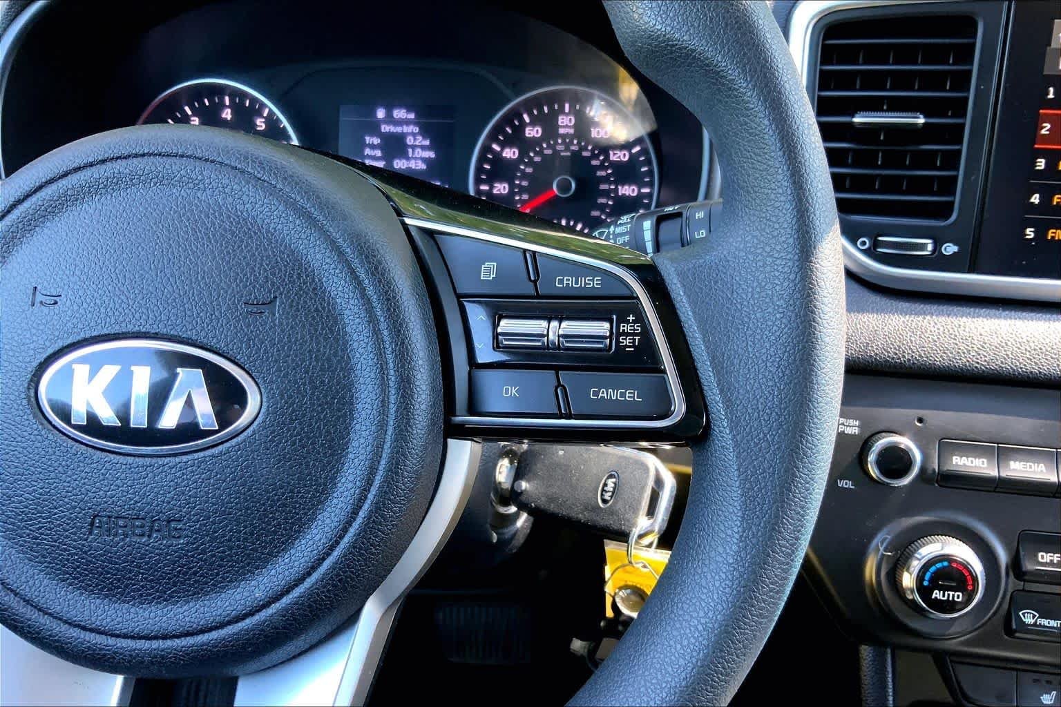 Used 2021 Black Cherry Kia LX image 25