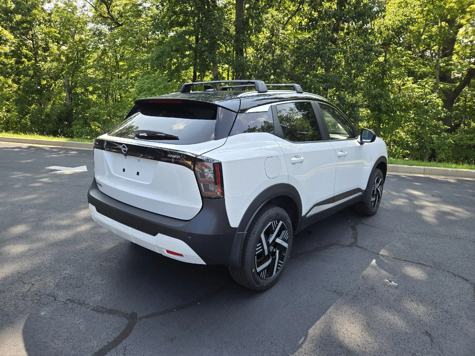 New 2026 Aspen White Tricoat/Super Black Nissan SV image 3