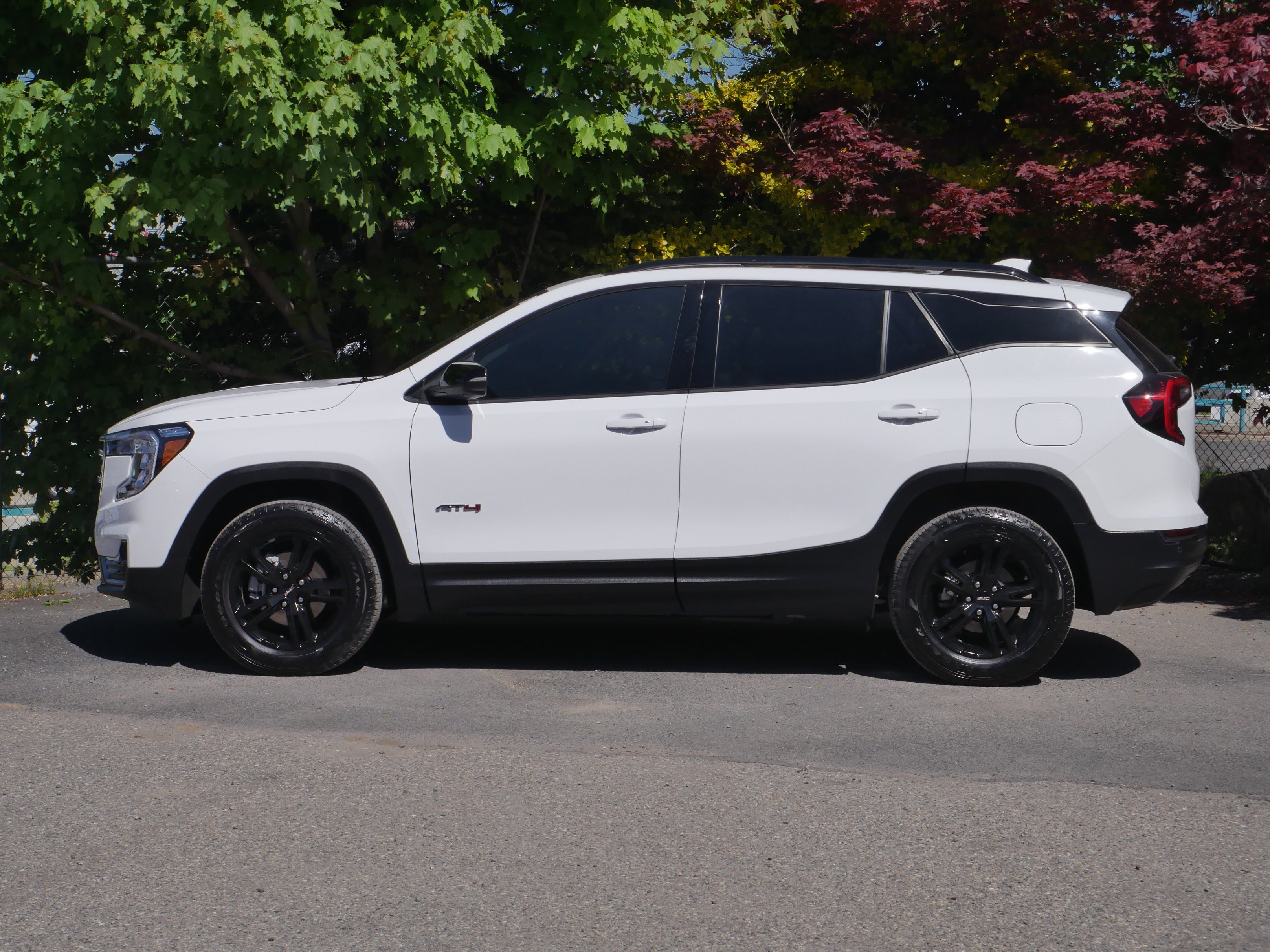 Used 2024 Summit White GMC AT4 image 7