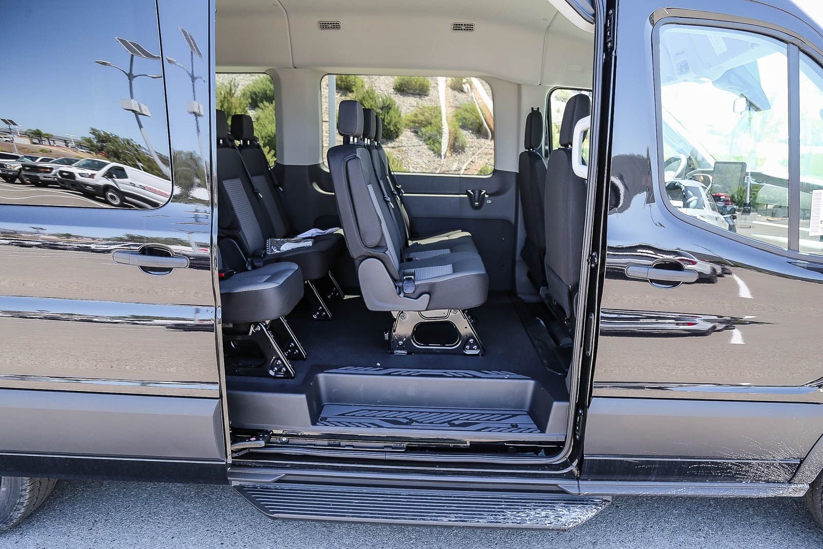New 2026 Agate Black Metallic Ford Passenger Van XLT image 8