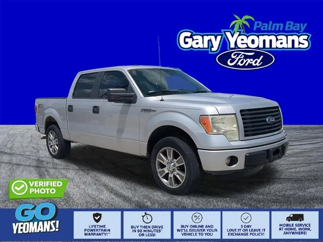 Used 2014 Ingot Silver Ford STX image 1