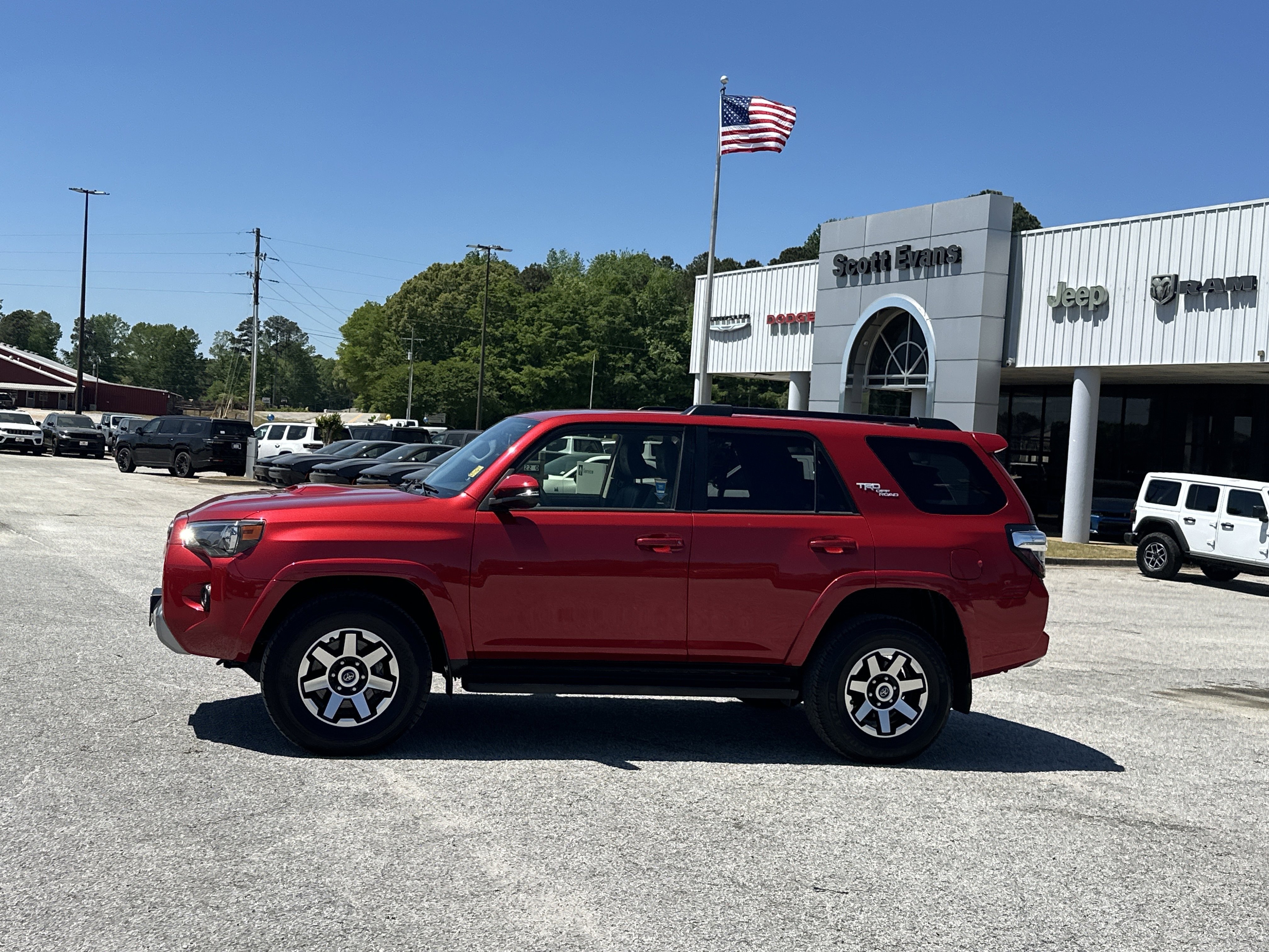 Used 2024 Barcelona Red Metallic Toyota TRD Off Road Premium image 5
