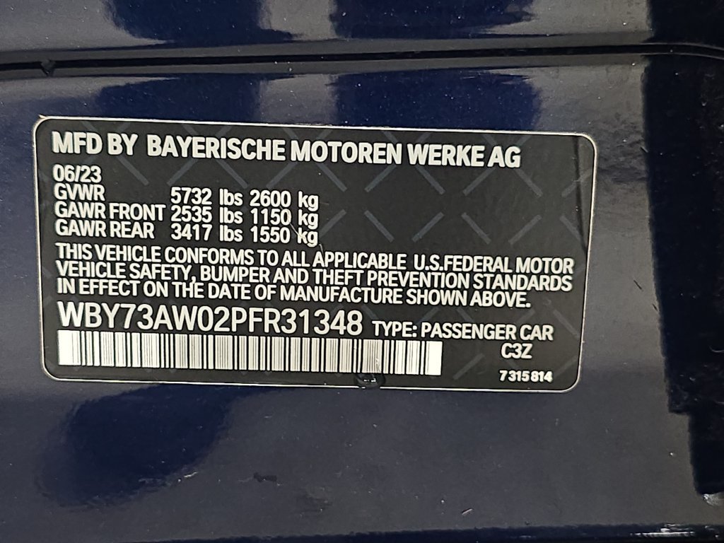 Used 2023 Tanzanite Blue II Metallic BMW eDrive40 image 34