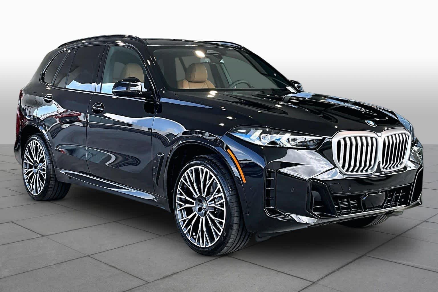 New 2026 Black Sapphire Metallic BMW sDrive40i image 2