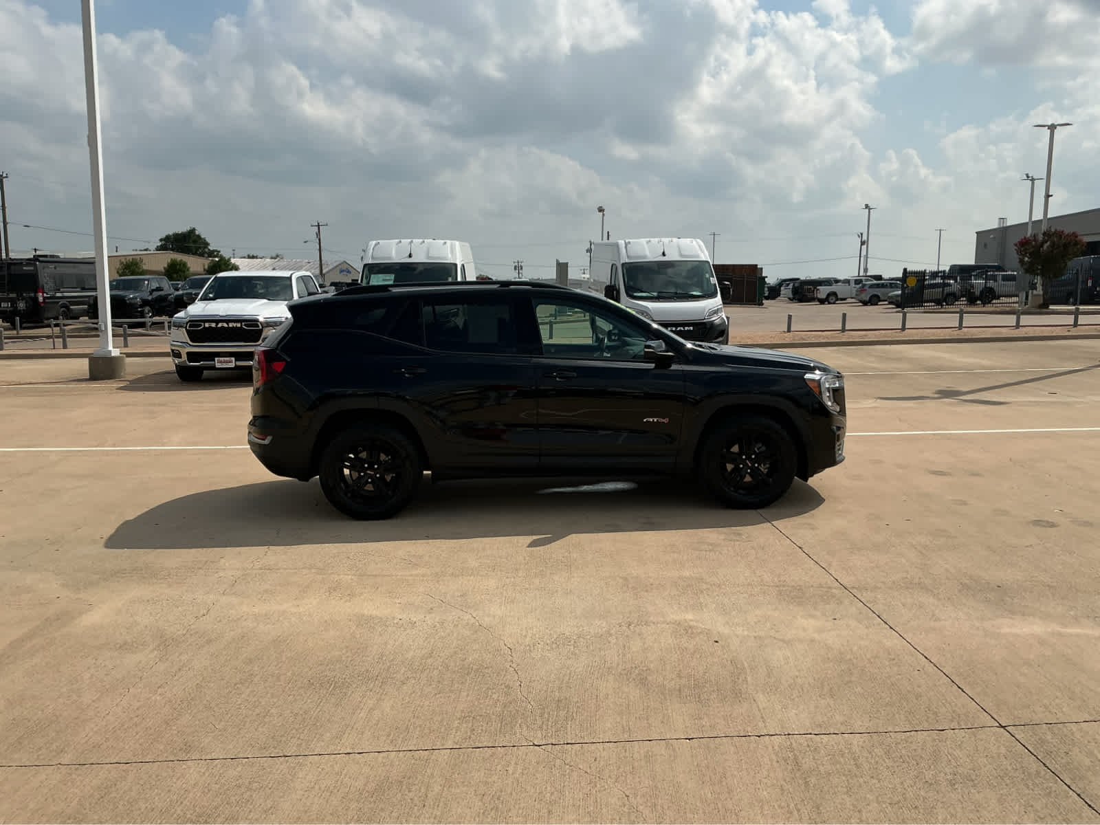 Used 2023 Ebony Twilight Metallic GMC AT4 image 5