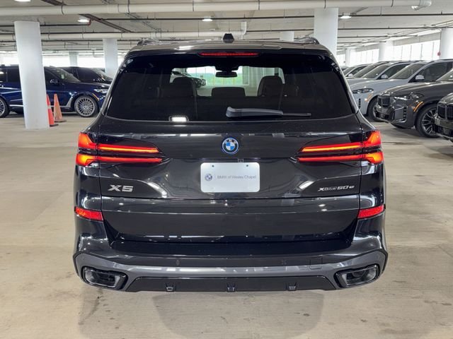 New 2026 Black Sapphire Metallic BMW xDrive50e image 6
