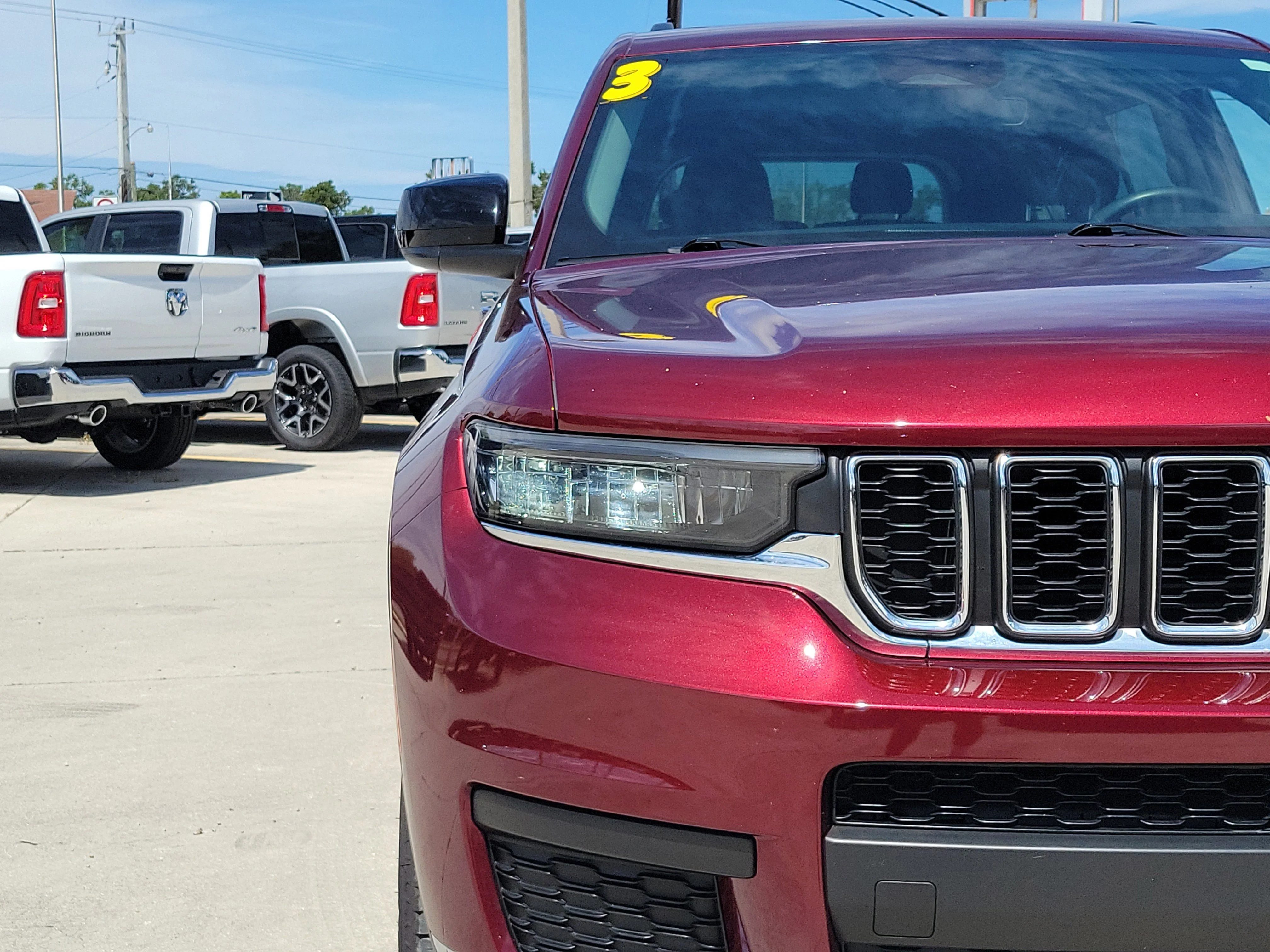 Used 2023 Velvet Red Pearlcoat Jeep Laredo image 7