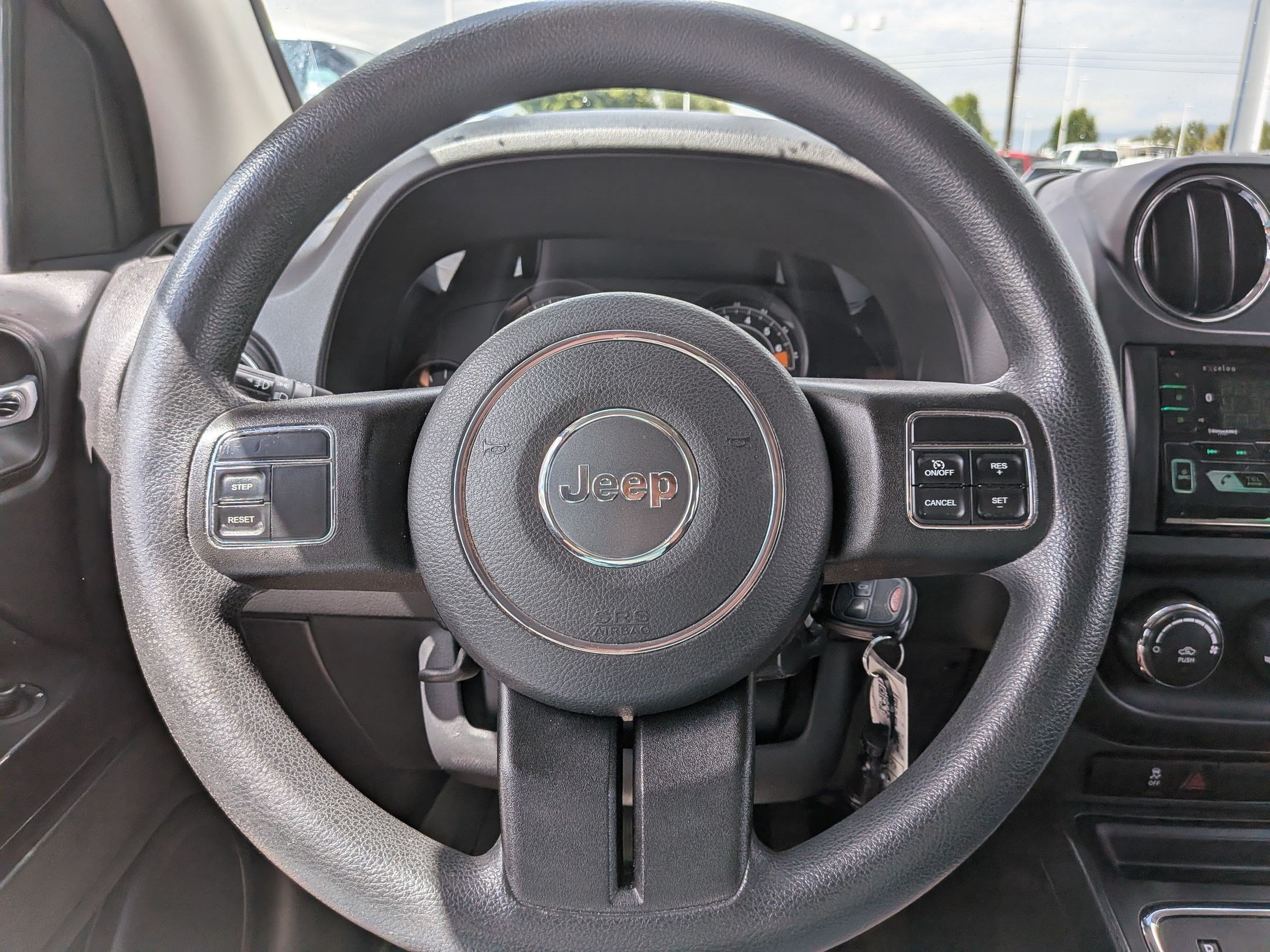 Used 2014 Billet Silver Clearcoat Metallic Jeep Sport image 15