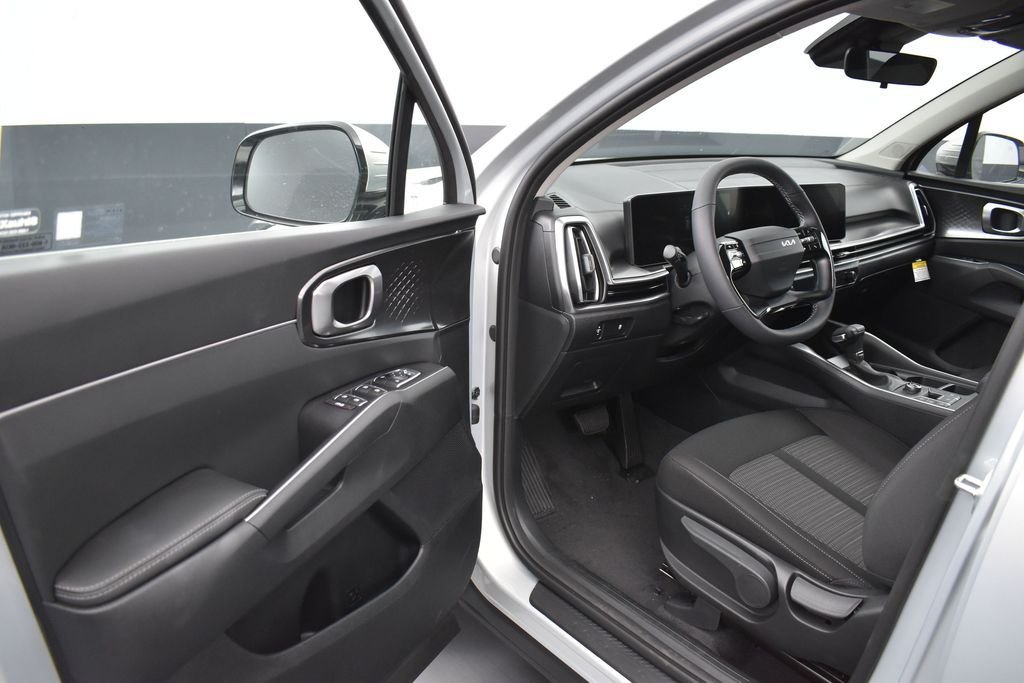 New 2026 Ivory Silver Kia LX image 5