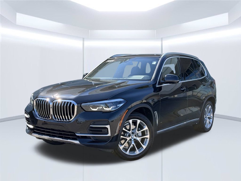 Used 2022 Black BMW sDrive40i image 1