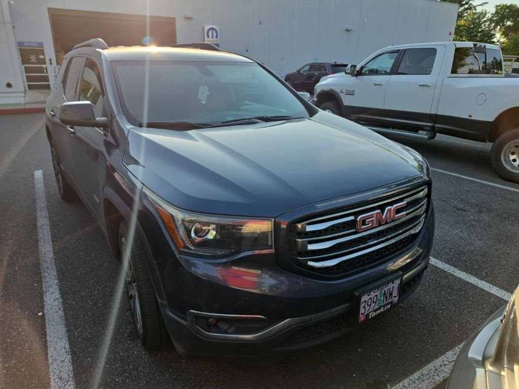 Used 2018 Blue Steel Metallic GMC SLT-1 image 1