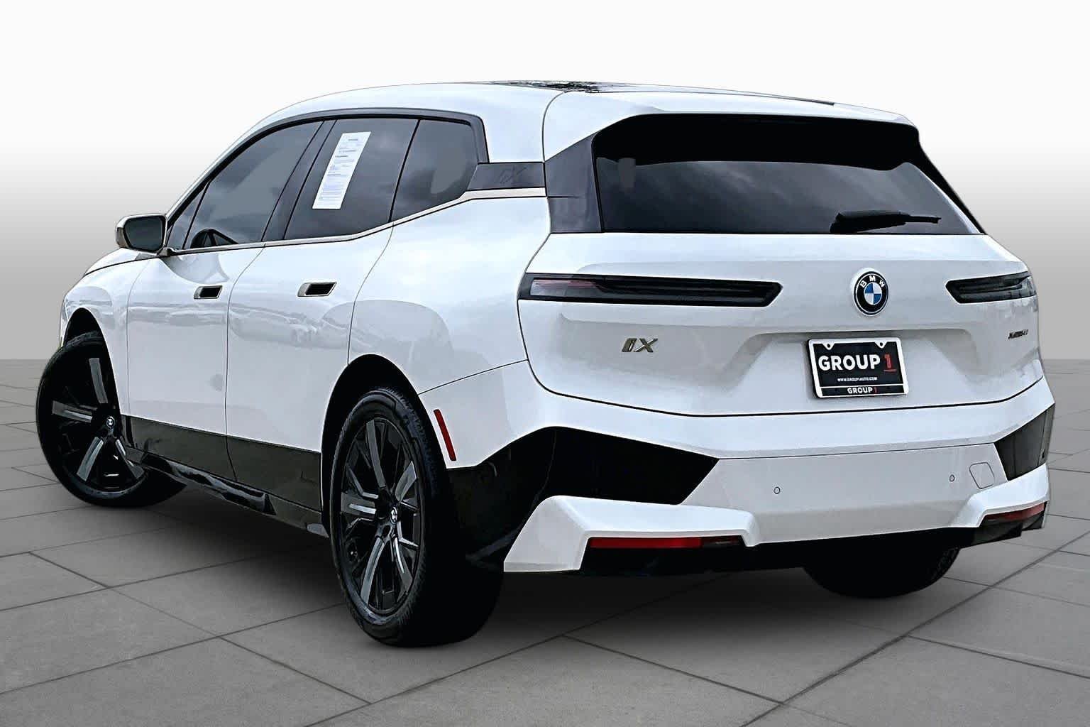 Used 2024 Mineral White Metallic BMW xDrive50 image 11