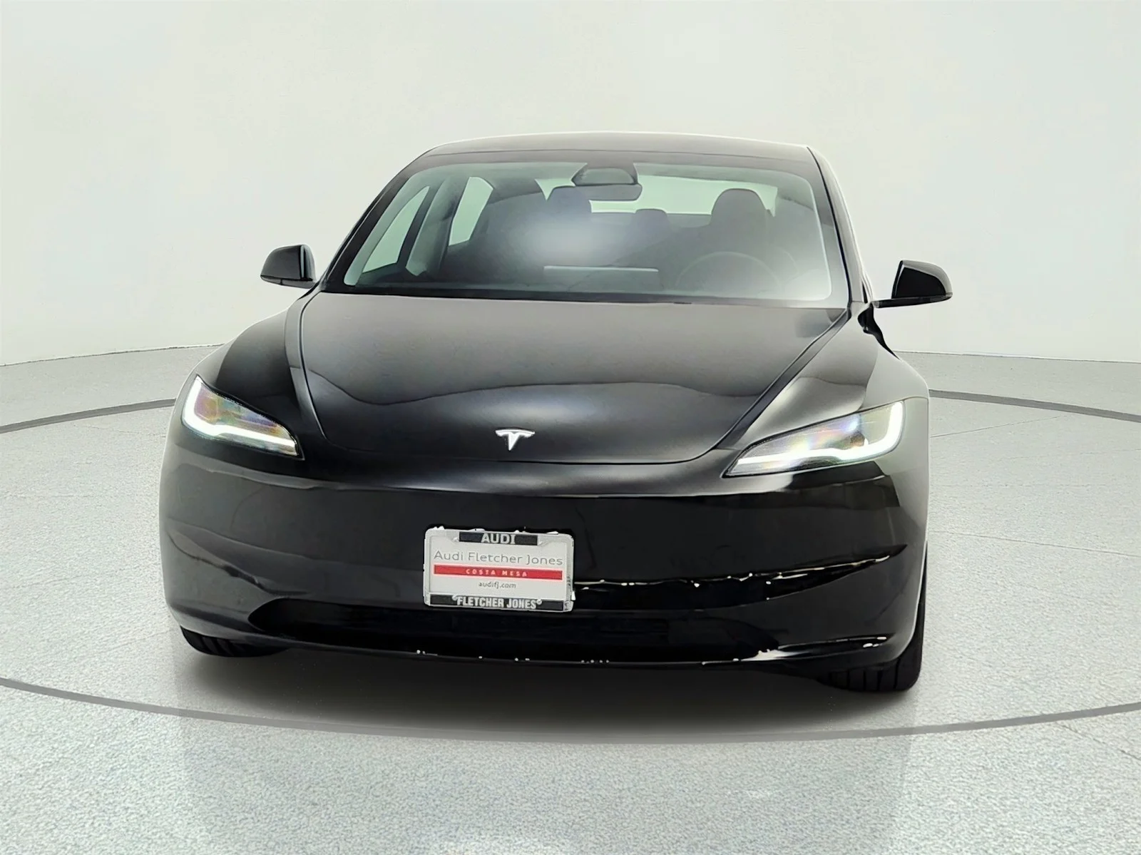 Used 2024 Solid Black Tesla Long Range image 2