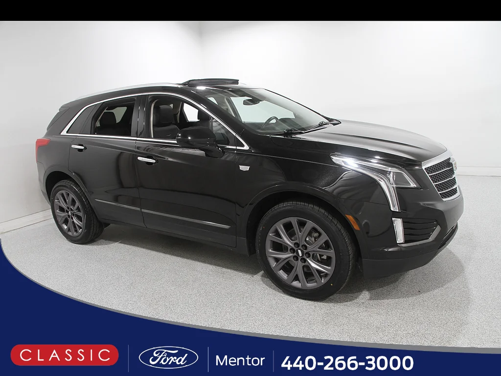 Used 2019 Stellar Black Metallic Cadillac Luxury image 1