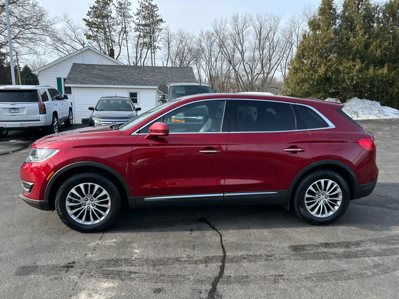 Used 2016 Ruby Red Metallic Tinted Clearcoat Lincoln Select image 6