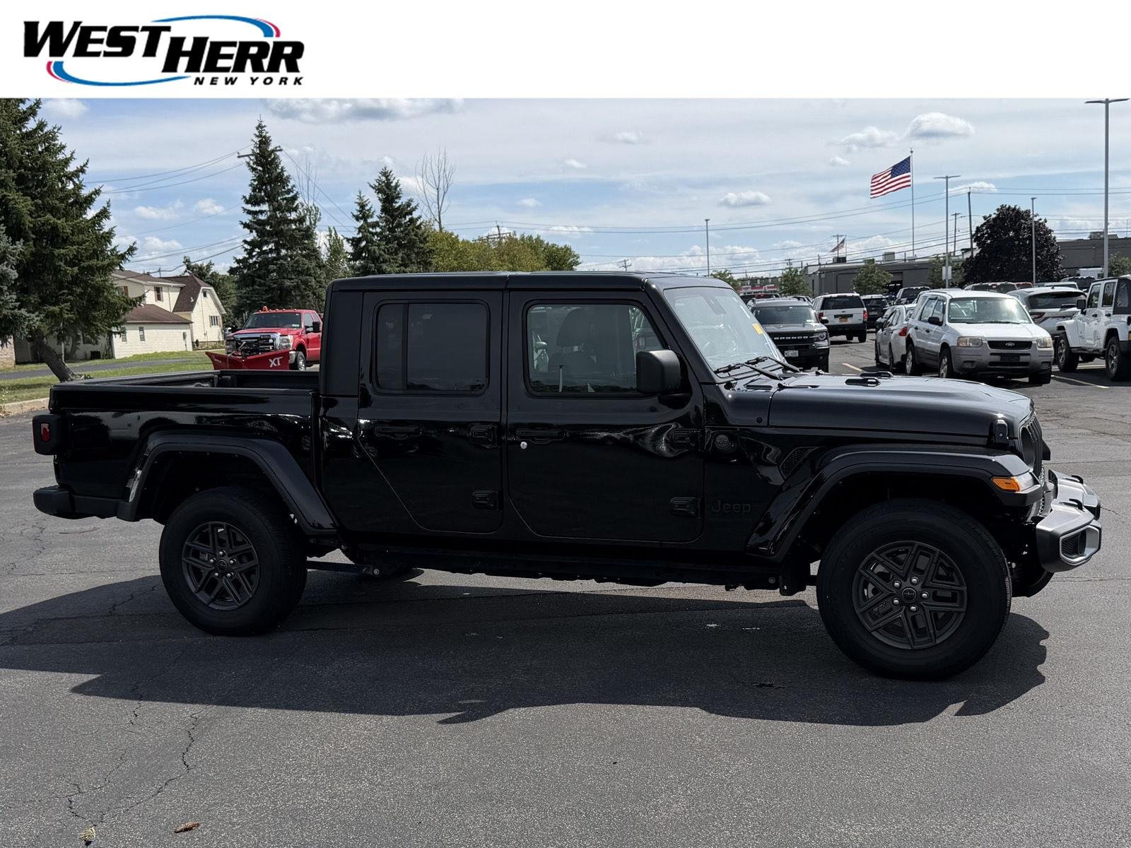 Used 2024 Black Clearcoat Jeep Sport S image 1