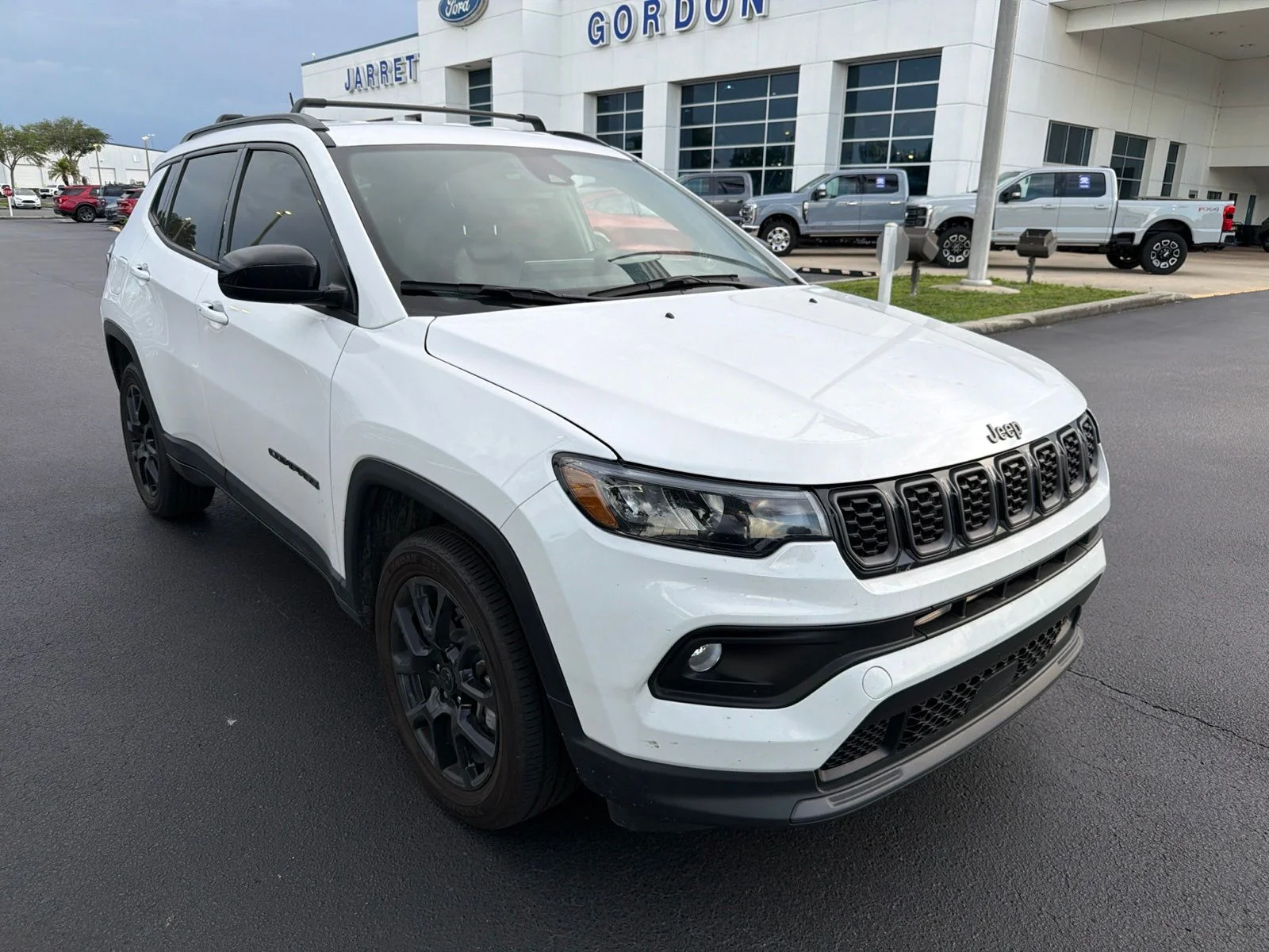 Certified Used 2025 White Jeep Latitude image 1