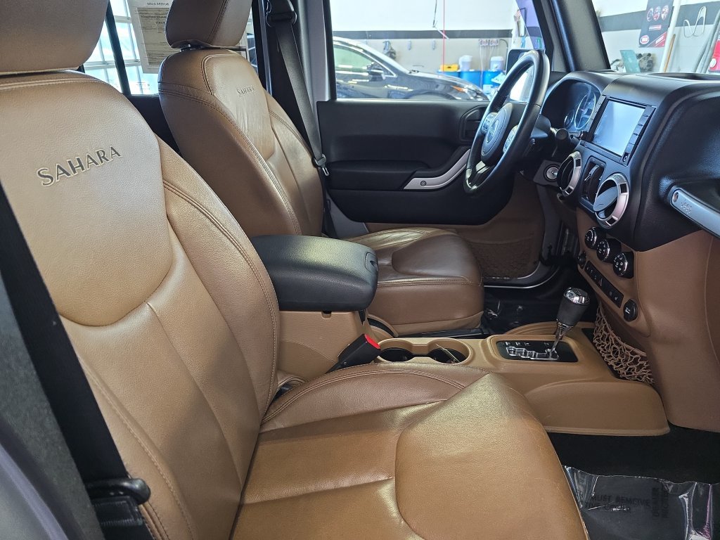Used 2016 Silver Jeep Unlimited Sahara image 11