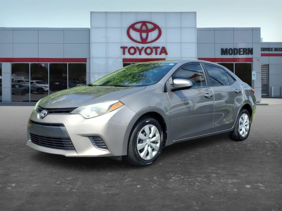 Used 2016 Brown Sugar Metallic Toyota LE image 1