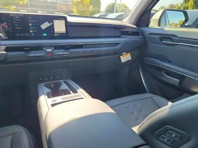 New 2026 Ivory Silver Kia Wind AWD image 12