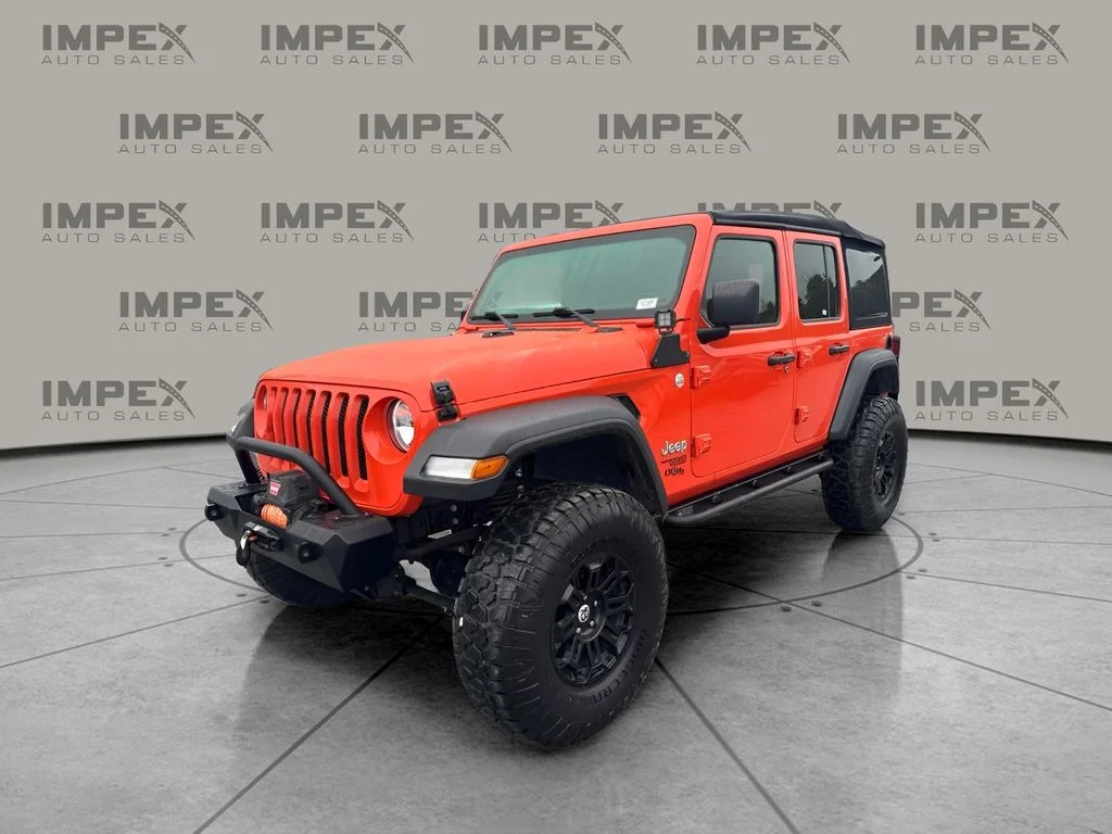 Used 2018 Orange Jeep Unlimited Sport S image 1