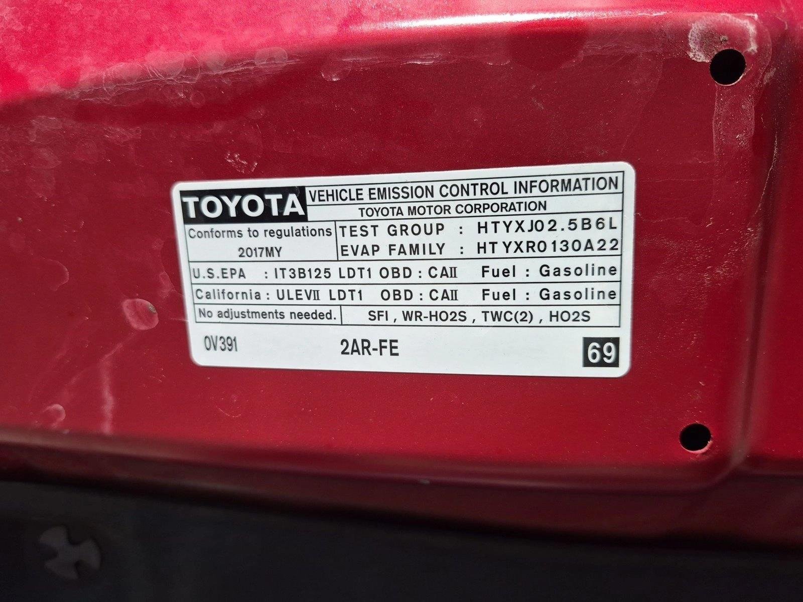 Used 2017 Barcelona Red Metallic Toyota LE image 23