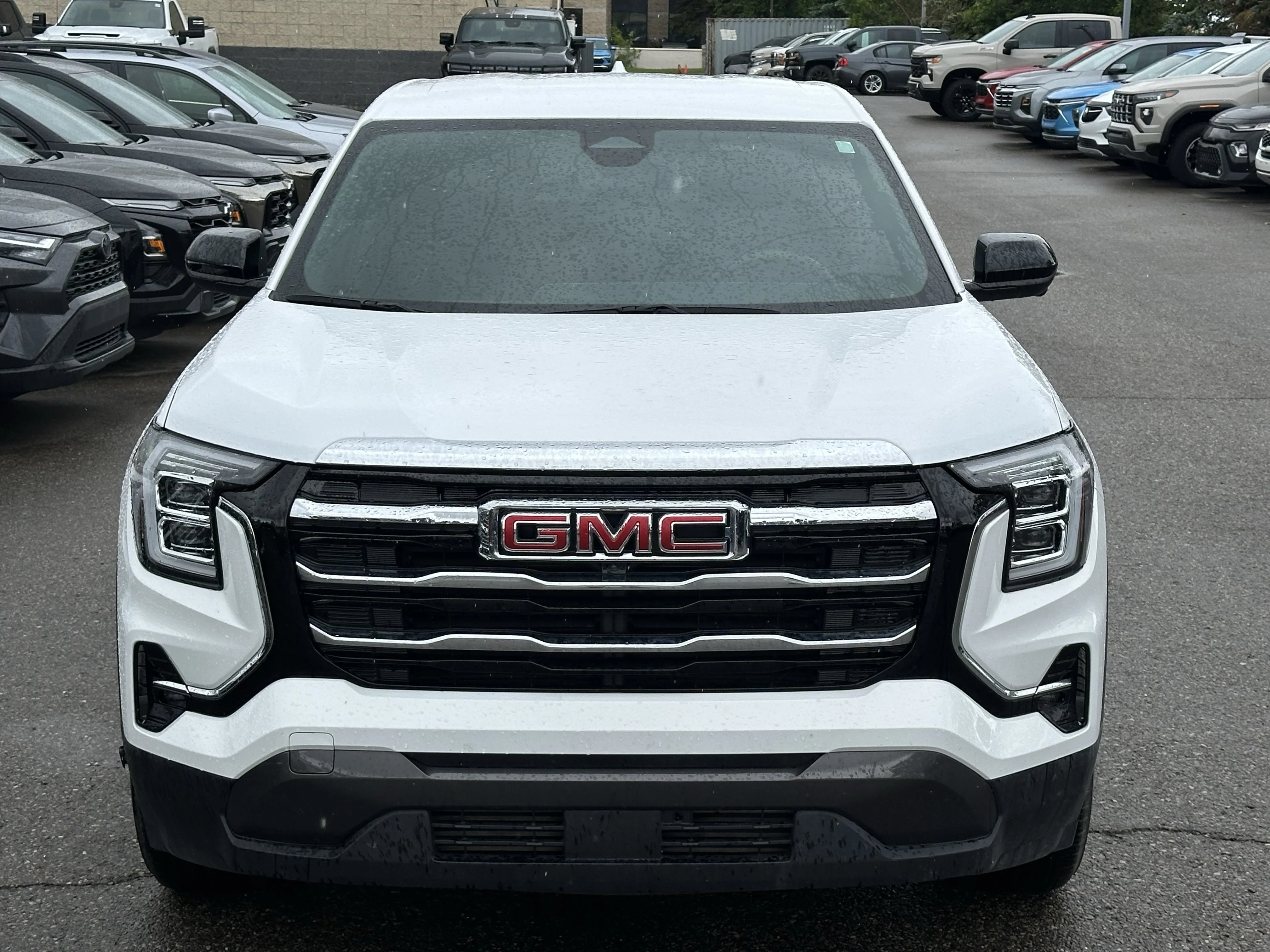 Certified Used 2025 White GMC AWD Elevation image 2