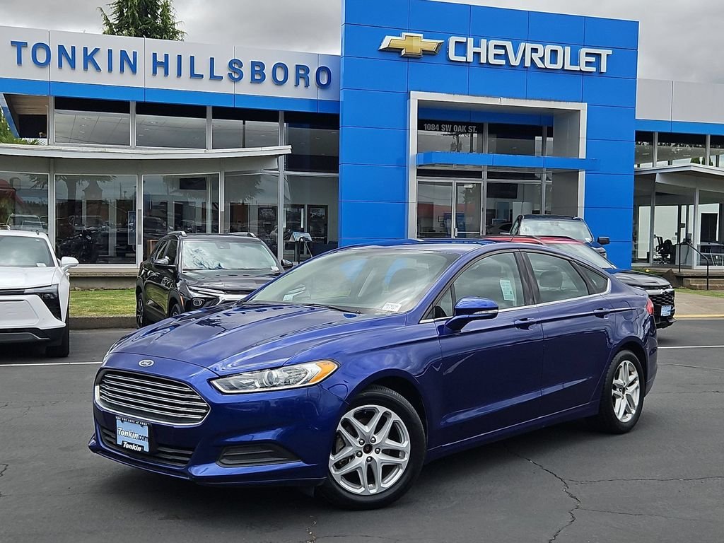 Used 2014 Blue Metallic Ford SE image 2