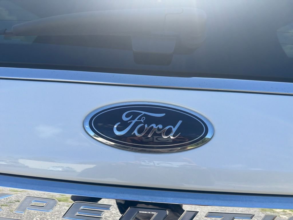 Used 2021 White Metallic Ford Limited image 22
