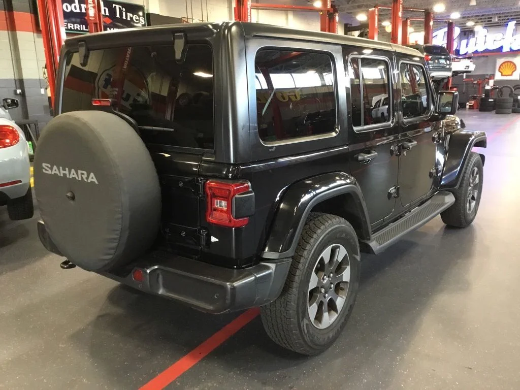 Used 2018 Black Jeep Unlimited Sahara image 5