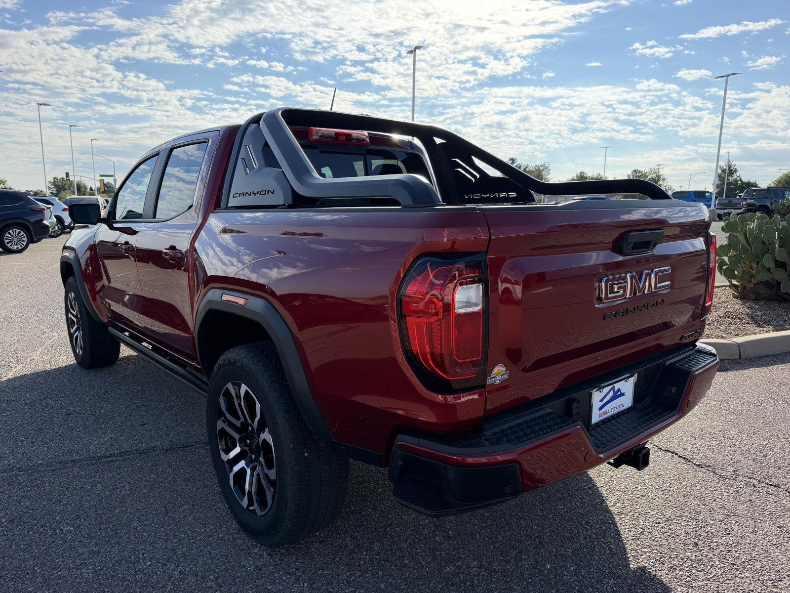 Used 2025 Volcanic Red Tintcoat GMC 4WD AT4 image 3