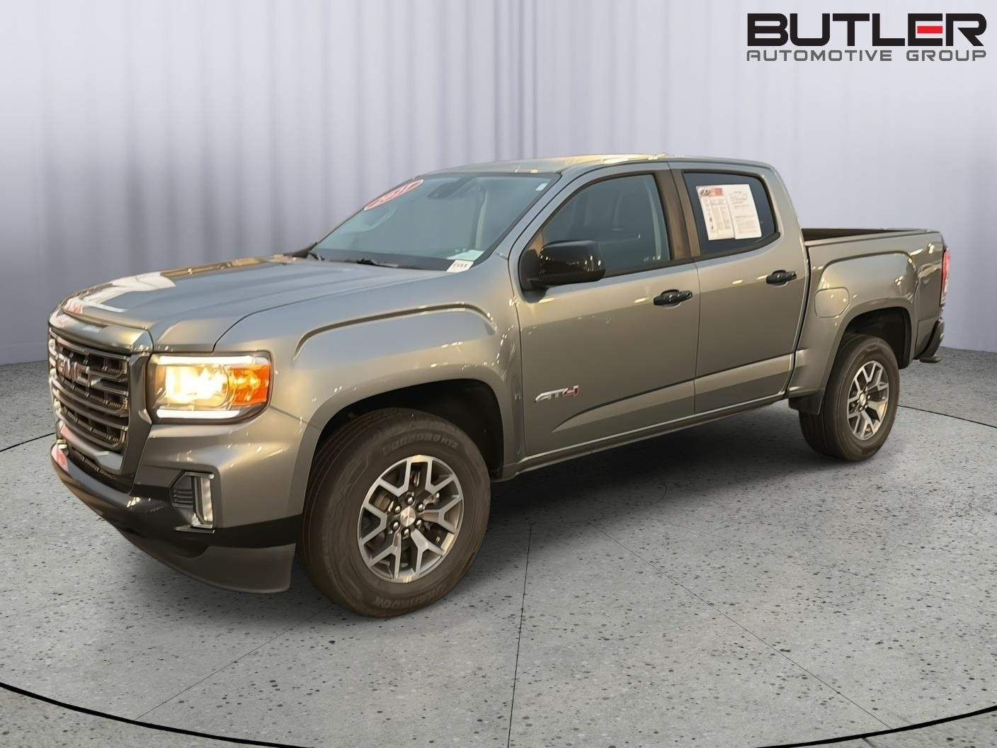 Used 2021 Satin Steel Metallic GMC 4WD AT4 w/Leather image 1