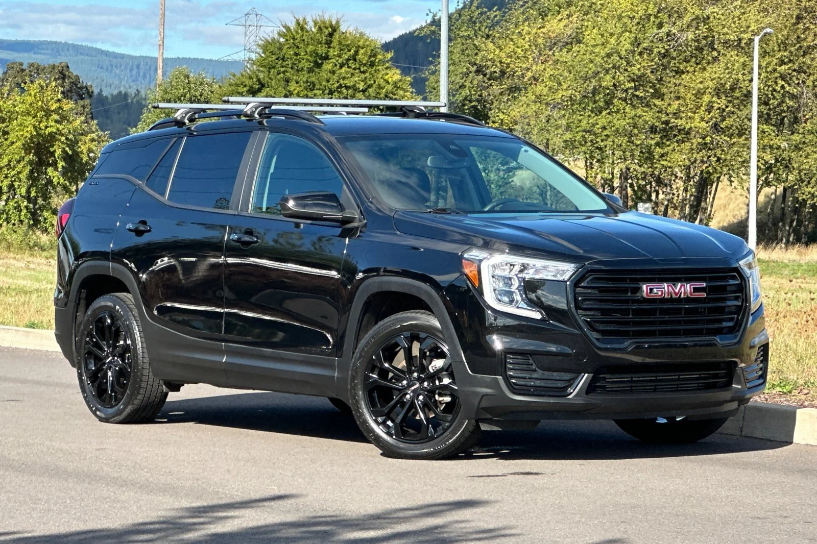 Used 2022 Black GMC SLE image 1