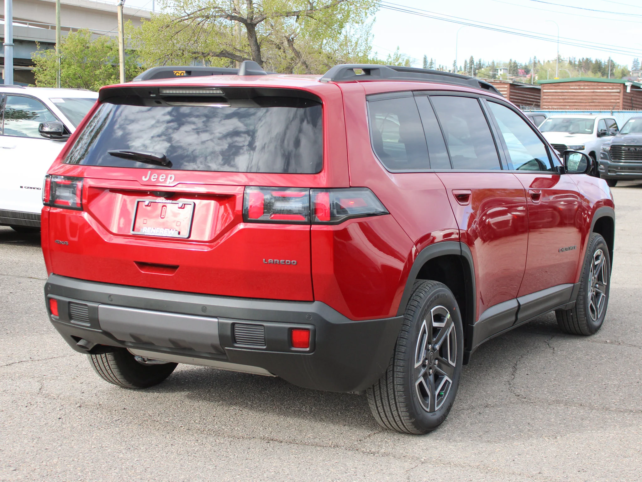 New 2026 Red Jeep Laredo * Hybrid image 5